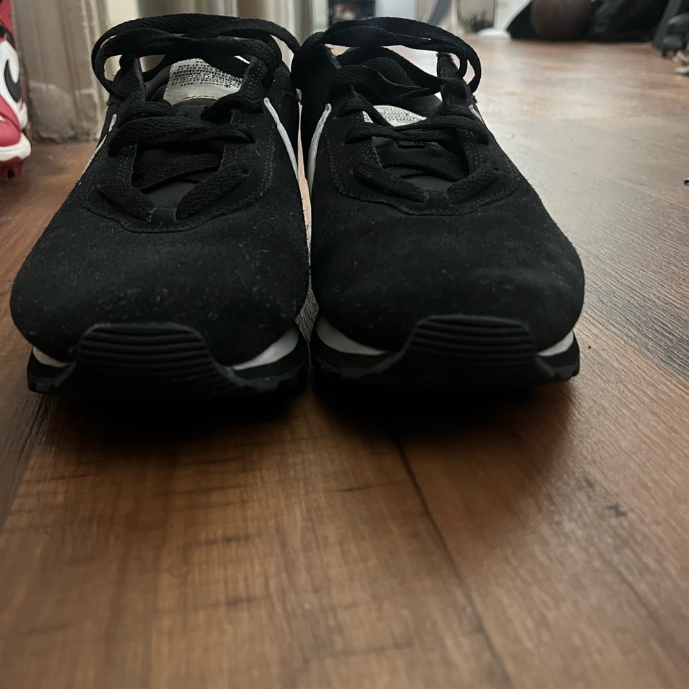 Woman’s Black Athletic Sneakers comforting during activity!